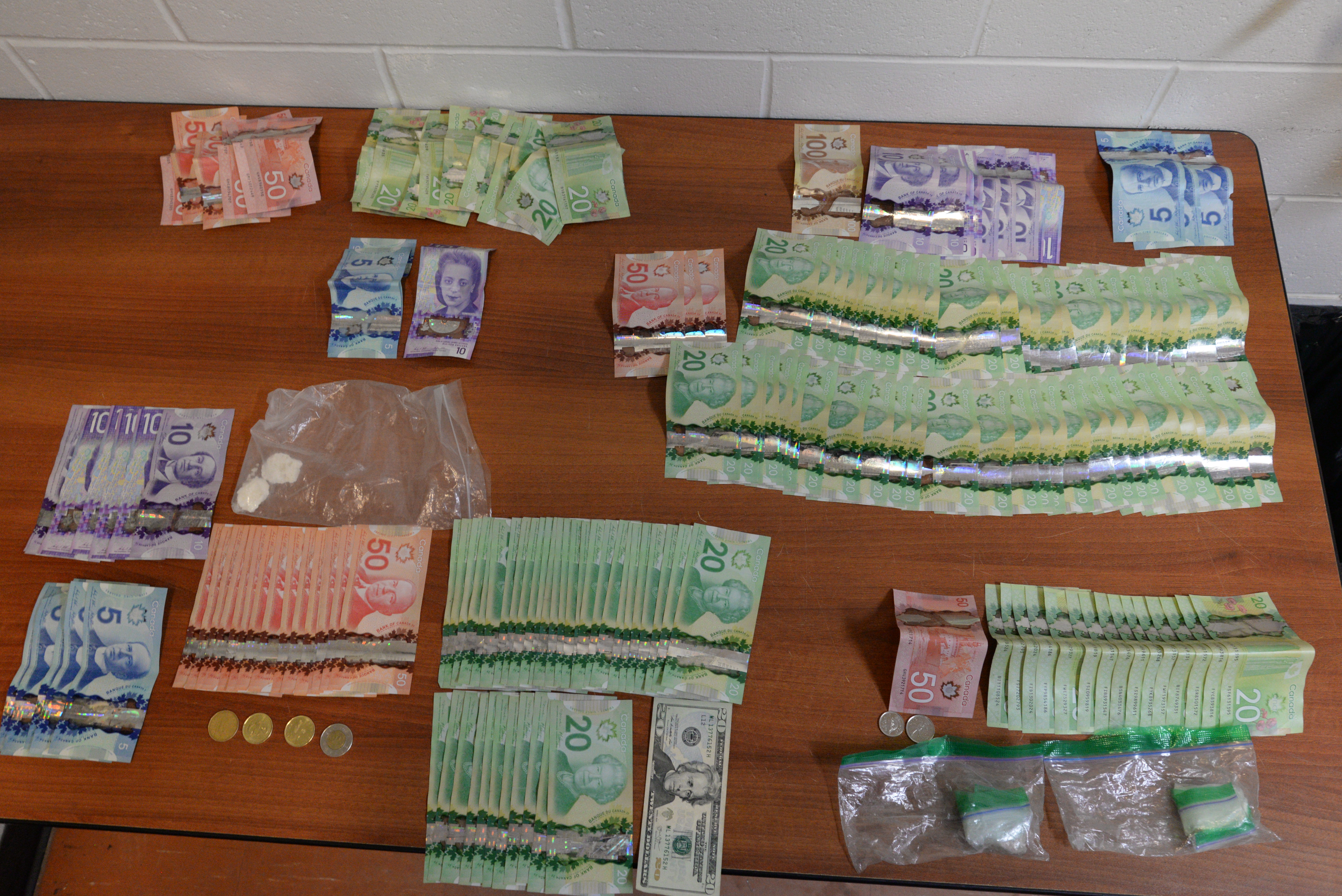 Police interrupt home takeover, seize fentanyl and cocaine, arrest four