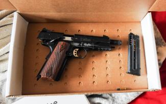 Three handguns, drugs and cash seized during search of apartment Three handguns, drugs and cash seized during search of apartment